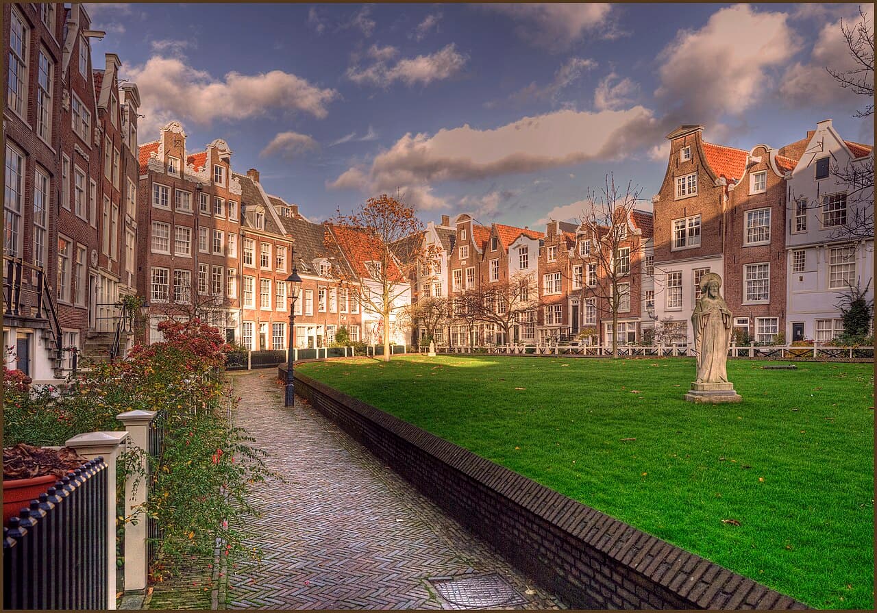 The quiet grassed courtyard and old houses of the Begijnhof