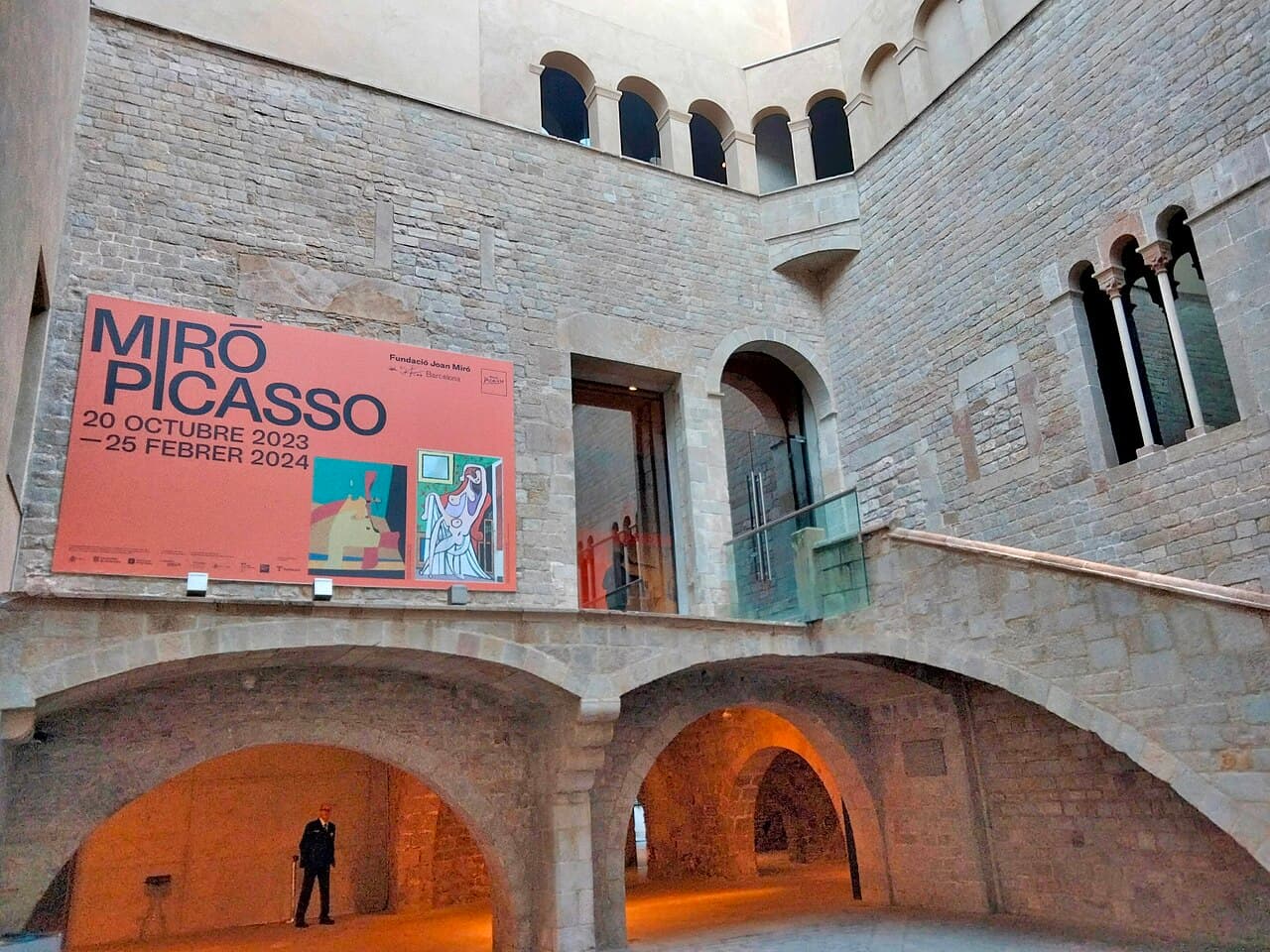 The stone courtyard staircase of the Picasso Museum's medieval palaces