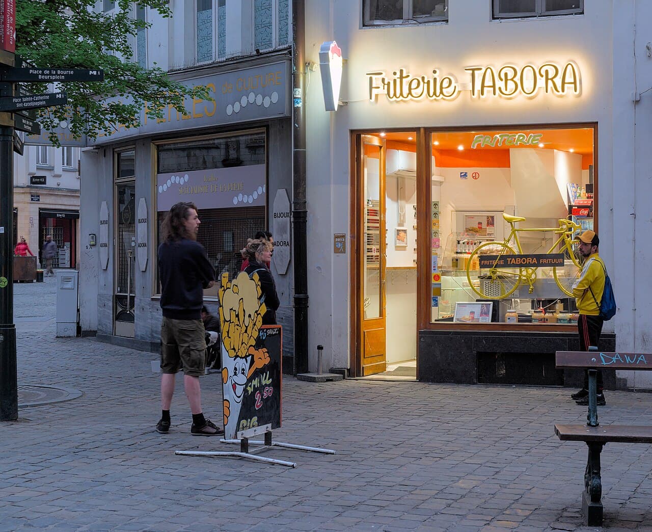 A cone of Belgian frites with mayonnaise