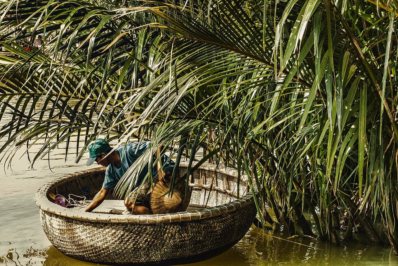 A round basket-boat in the coconut palms, Hoi An