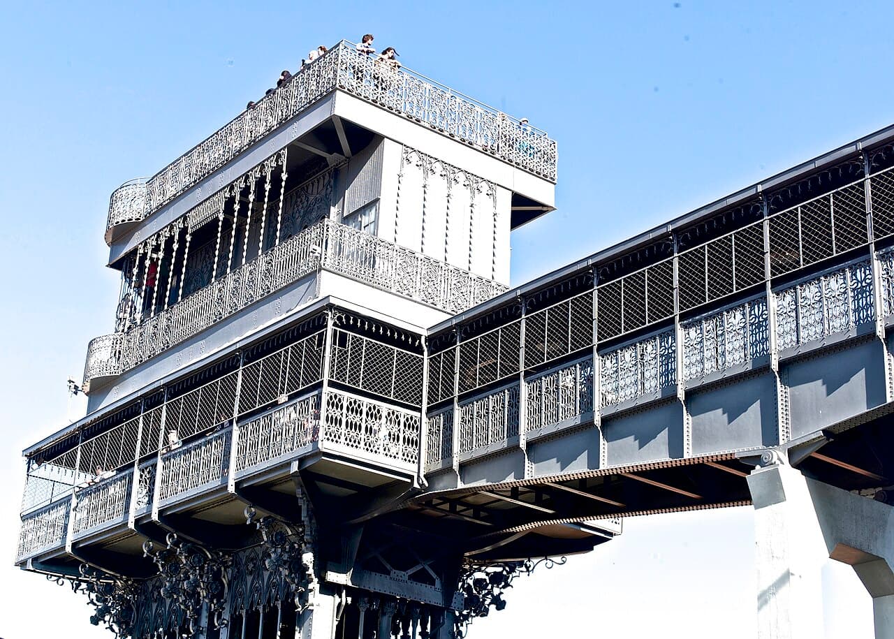 The iron Santa Justa Lift tower above Baixa's rooftops