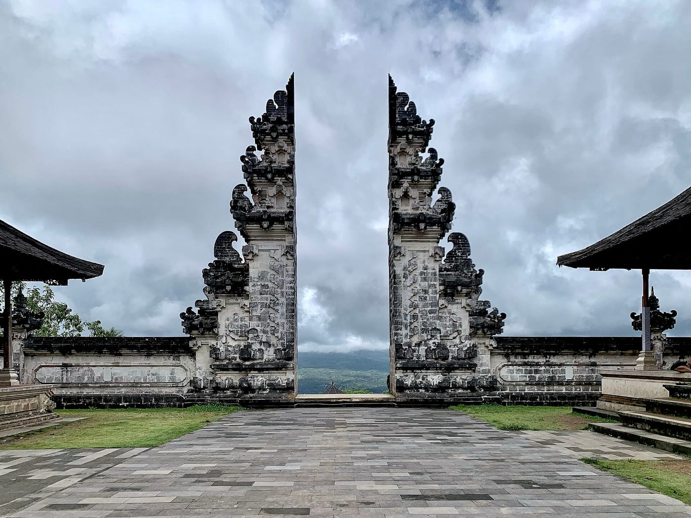 The split 'Gates of Heaven' temple gate framing a volcano at Pura Lempuyang, Bali