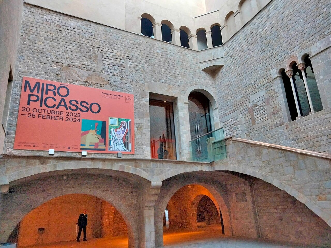 The stone courtyard staircase of the Picasso Museum's medieval palaces