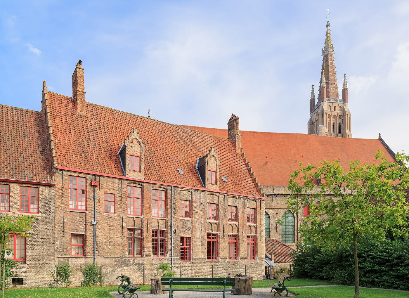 The medieval Sint-Janshospitaal and church spire in Bruges