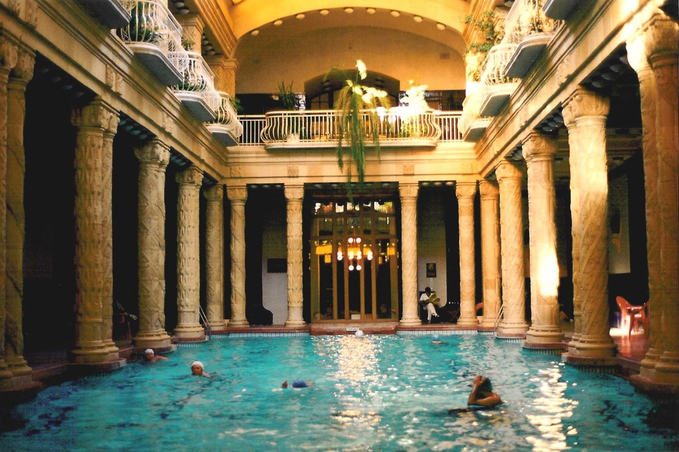 The columned Art Nouveau indoor pool of the Gellért Baths in Budapest