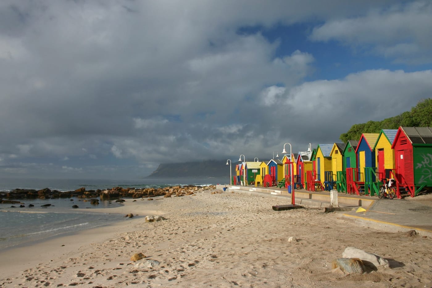 The colourful beach huts on the surf beach at Muizenberg, Cape Town