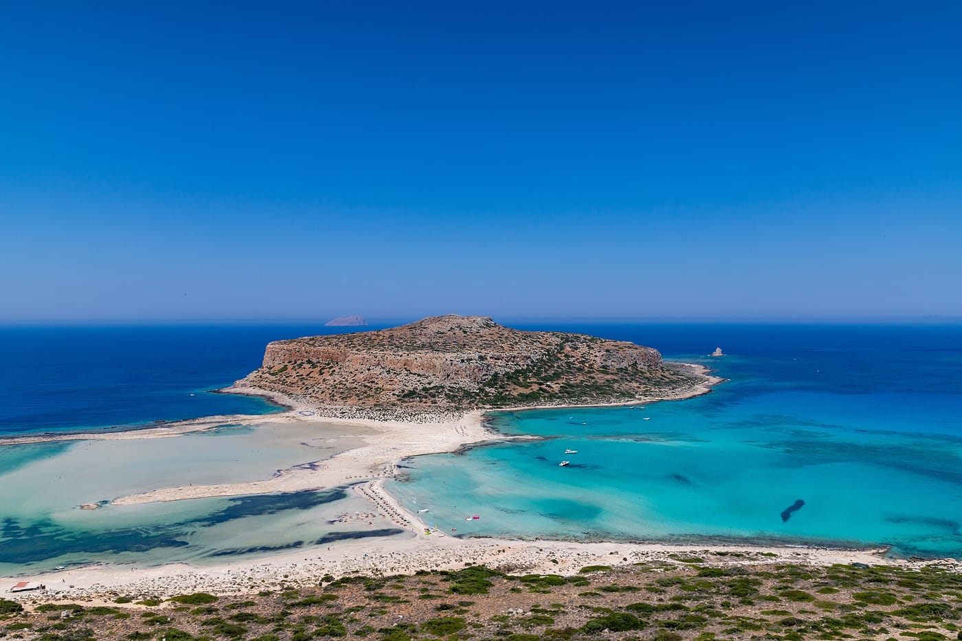 The turquoise water and pink sand of Balos Lagoon in Crete