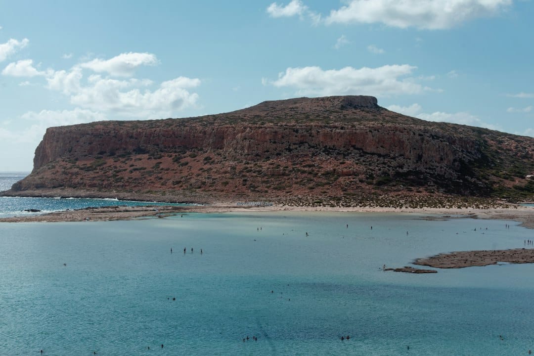 A turquoise cove between cliffs on the coast near Chania, Crete