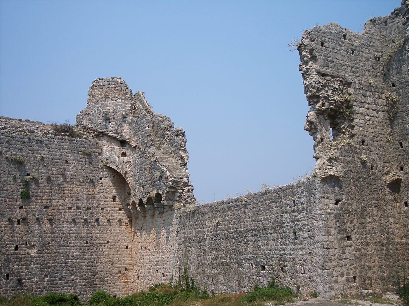 The long stone defensive walls climbing the hill above Ston in Croatia