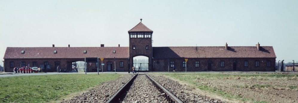 The gate and railway line into the Auschwitz-Birkenau memorial