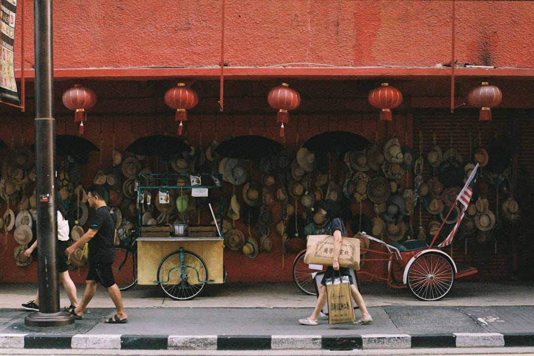 Red lanterns and murals in the Kwai Chai Hong lane in Kuala Lumpur