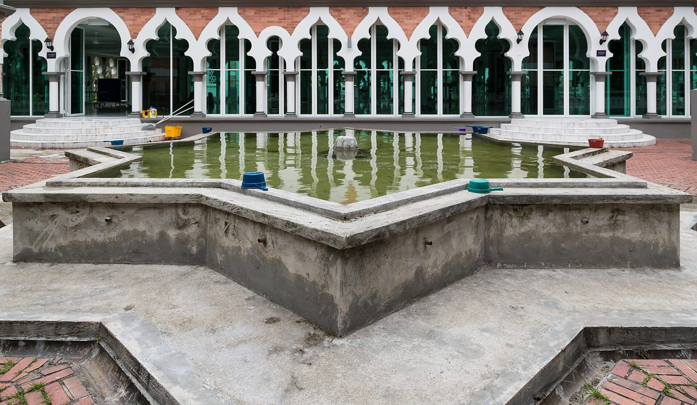 The Moorish domes and arches of Masjid Jamek in Kuala Lumpur