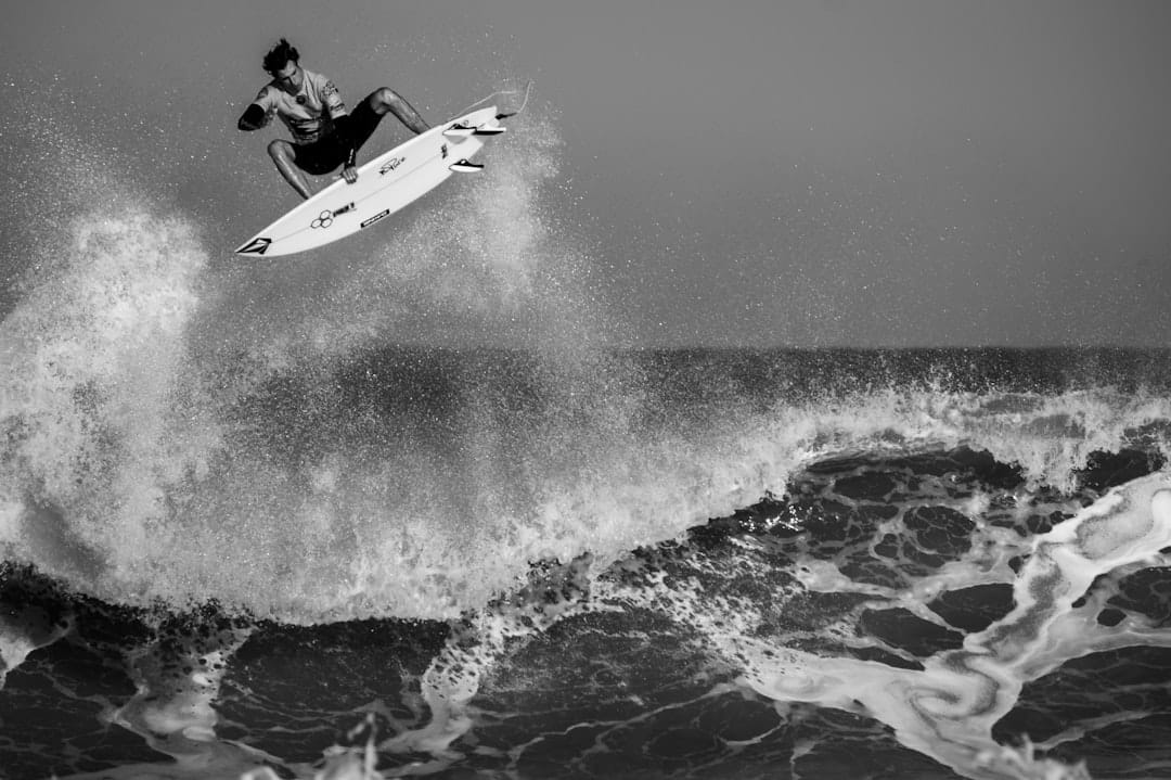 Surfing on the Algarve coast near Lagos