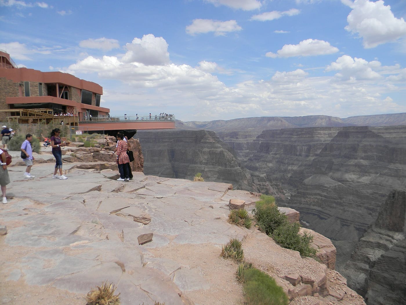 The rim of the Grand Canyon under a blue sky