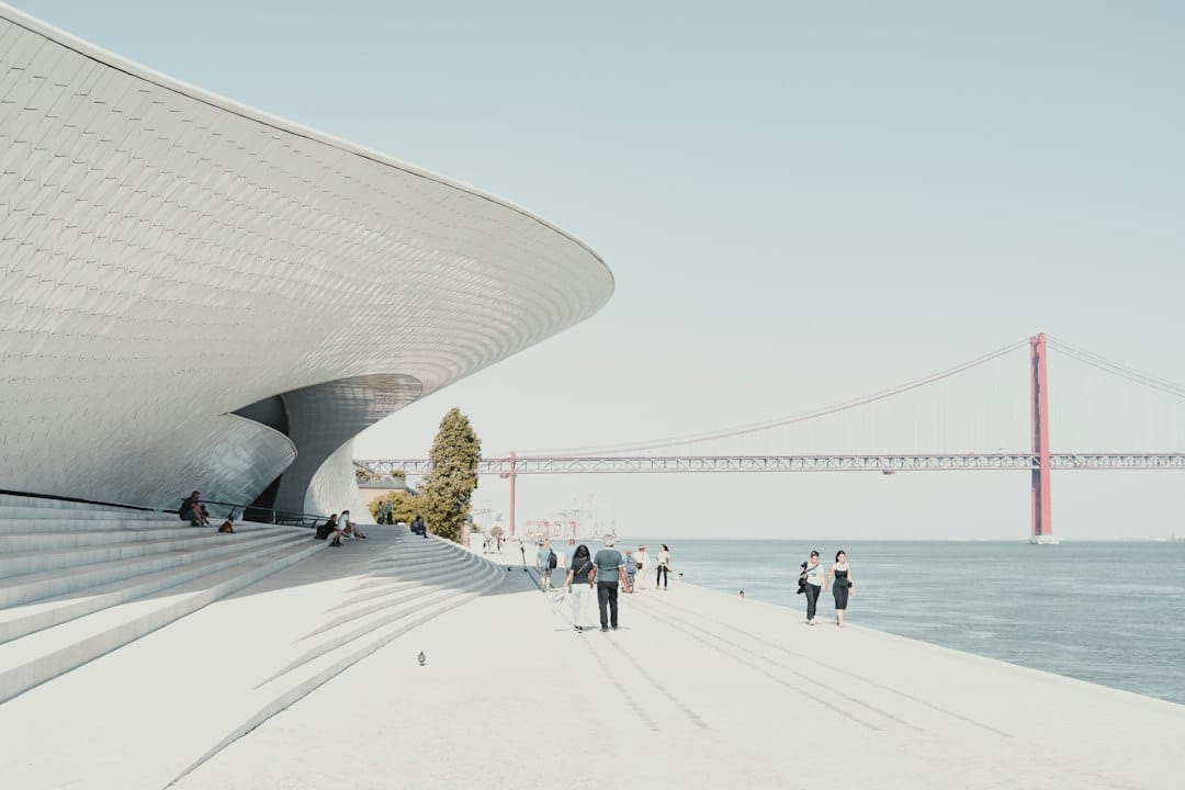 The curved white MAAT museum on the Lisbon riverfront