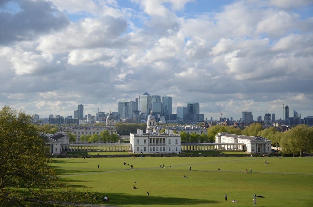 The Old Royal Naval College and Canary Wharf skyline seen from Greenwich Park