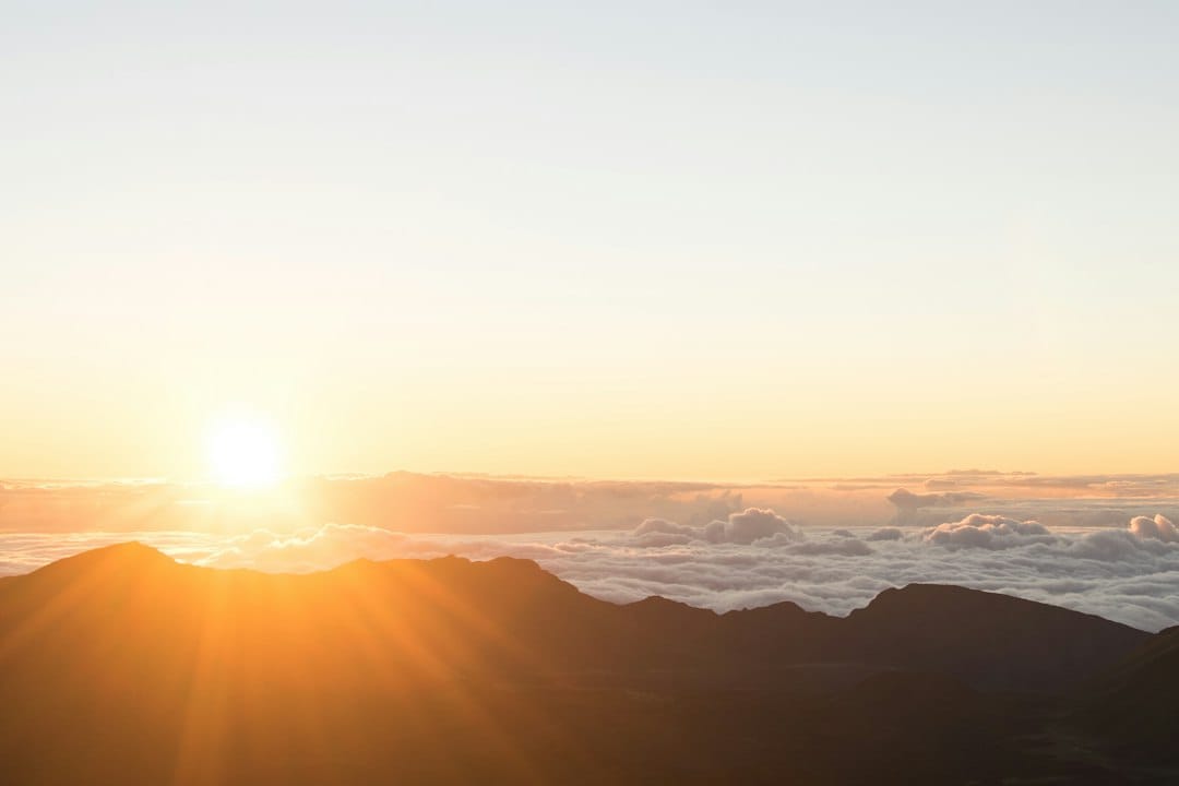 Sunrise above the clouds at Haleakala summit, Maui