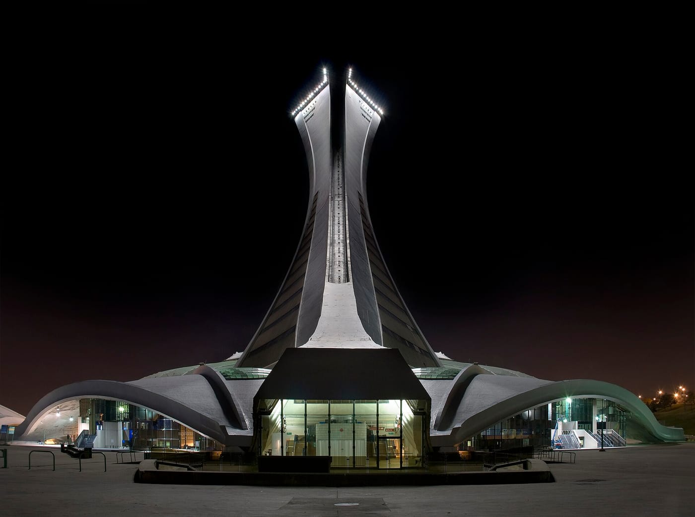 The inclined tower of the Montreal Olympic Stadium lit at night