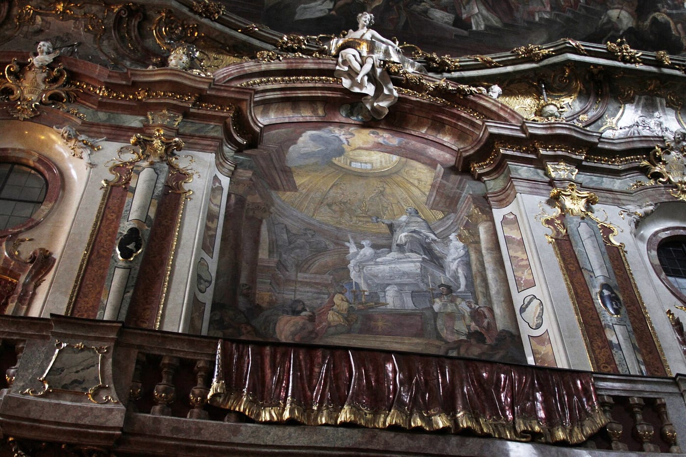 The gilded rococo interior of the Asamkirche in Munich