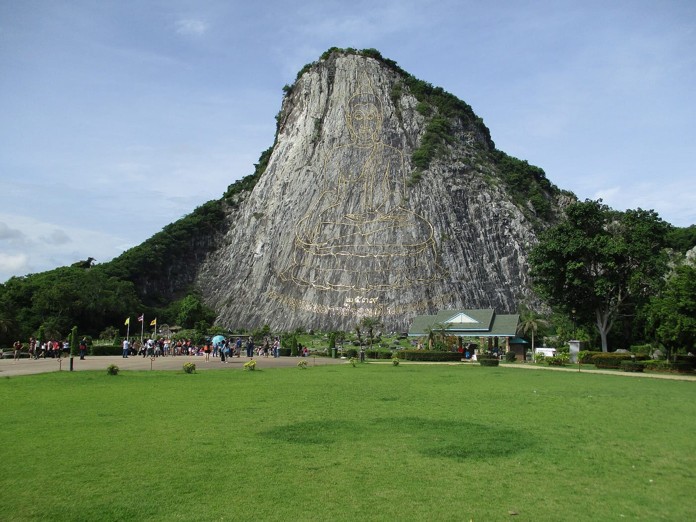 The giant golden Buddha etched into Khao Chi Chan mountain near Pattaya