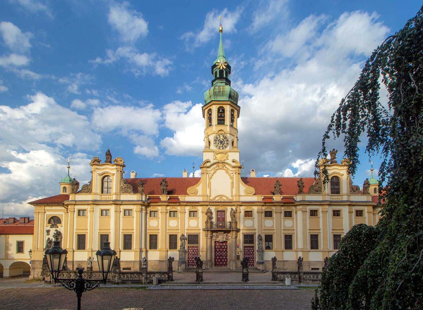 The baroque Loreta church and bell tower in Prague