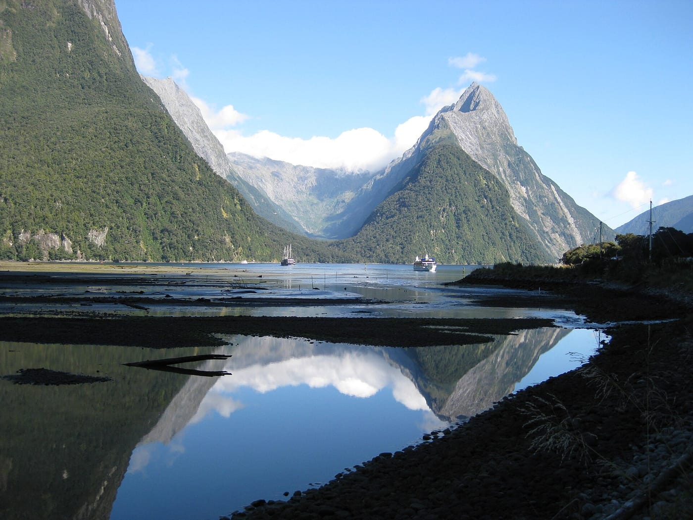 Mitre Peak reflected in the water of Milford Sound, New Zealand