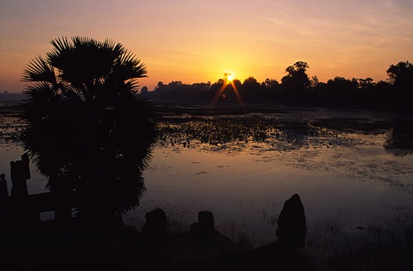 Sunset over the royal reservoir of Srah Srang at Angkor