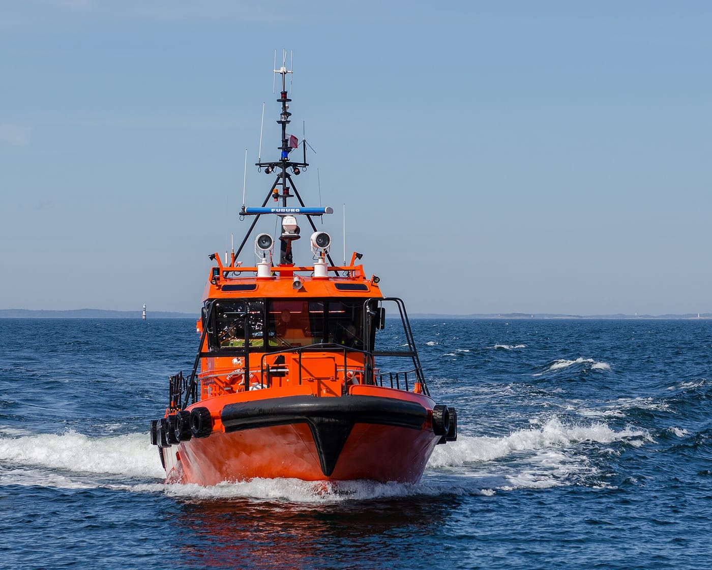 A boat on the water among the islands of the Stockholm archipelago