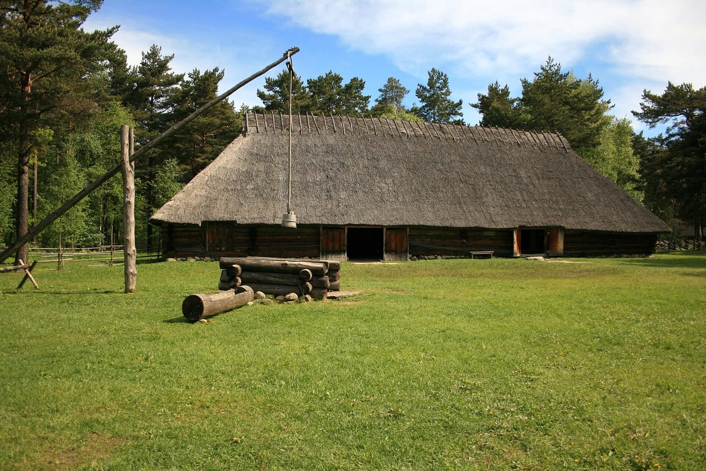 A thatched wooden farmhouse at the Estonian Open-Air Museum near Tallinn