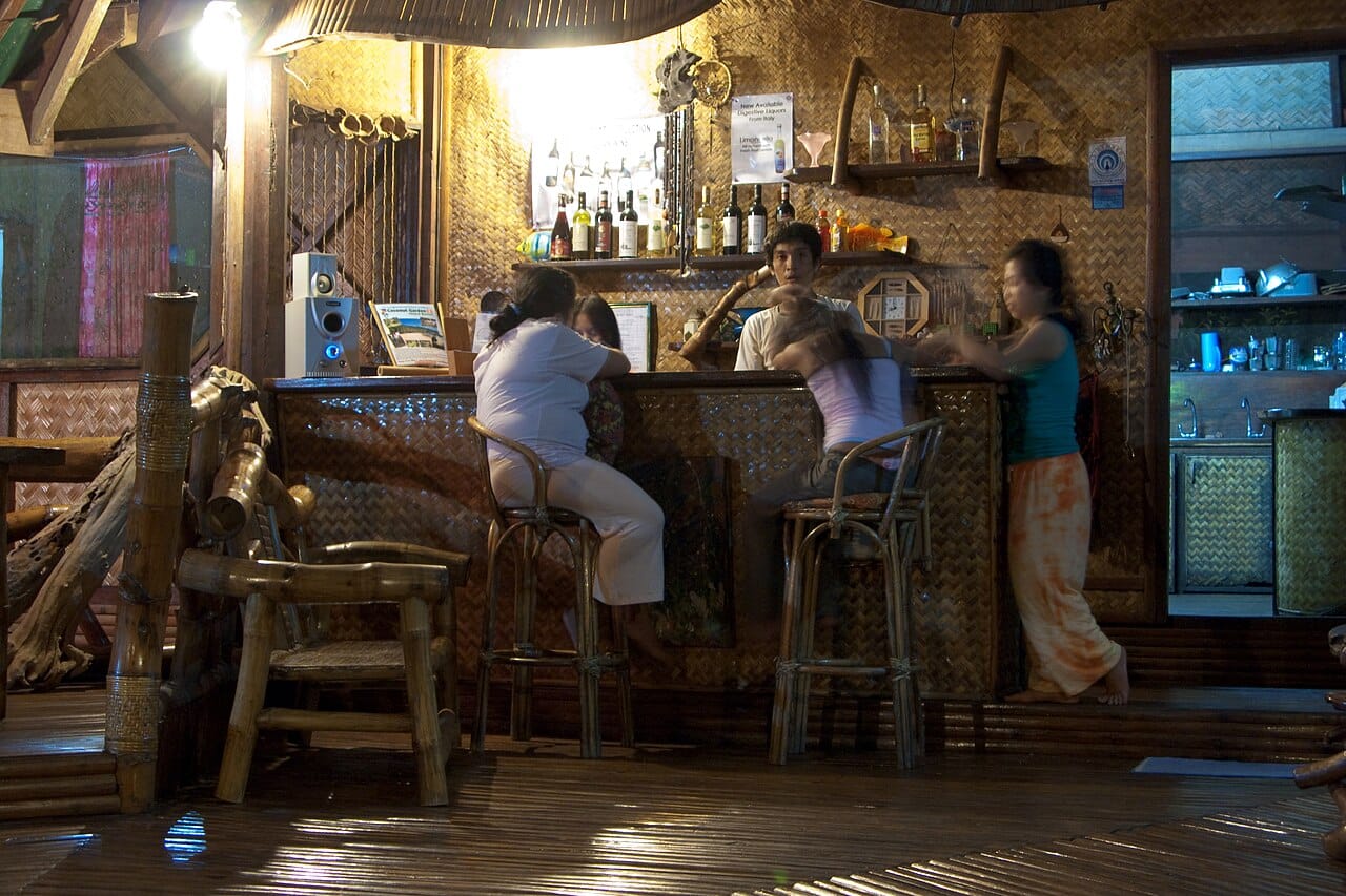 A jungle beach bar at night in Tulum