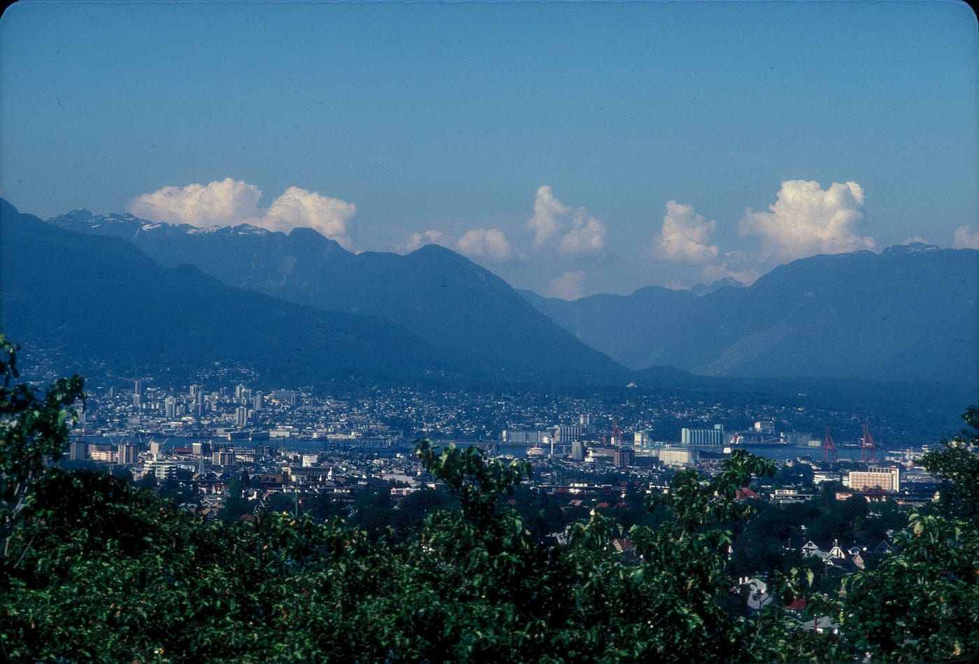 The Vancouver skyline and mountains seen from Queen Elizabeth Park