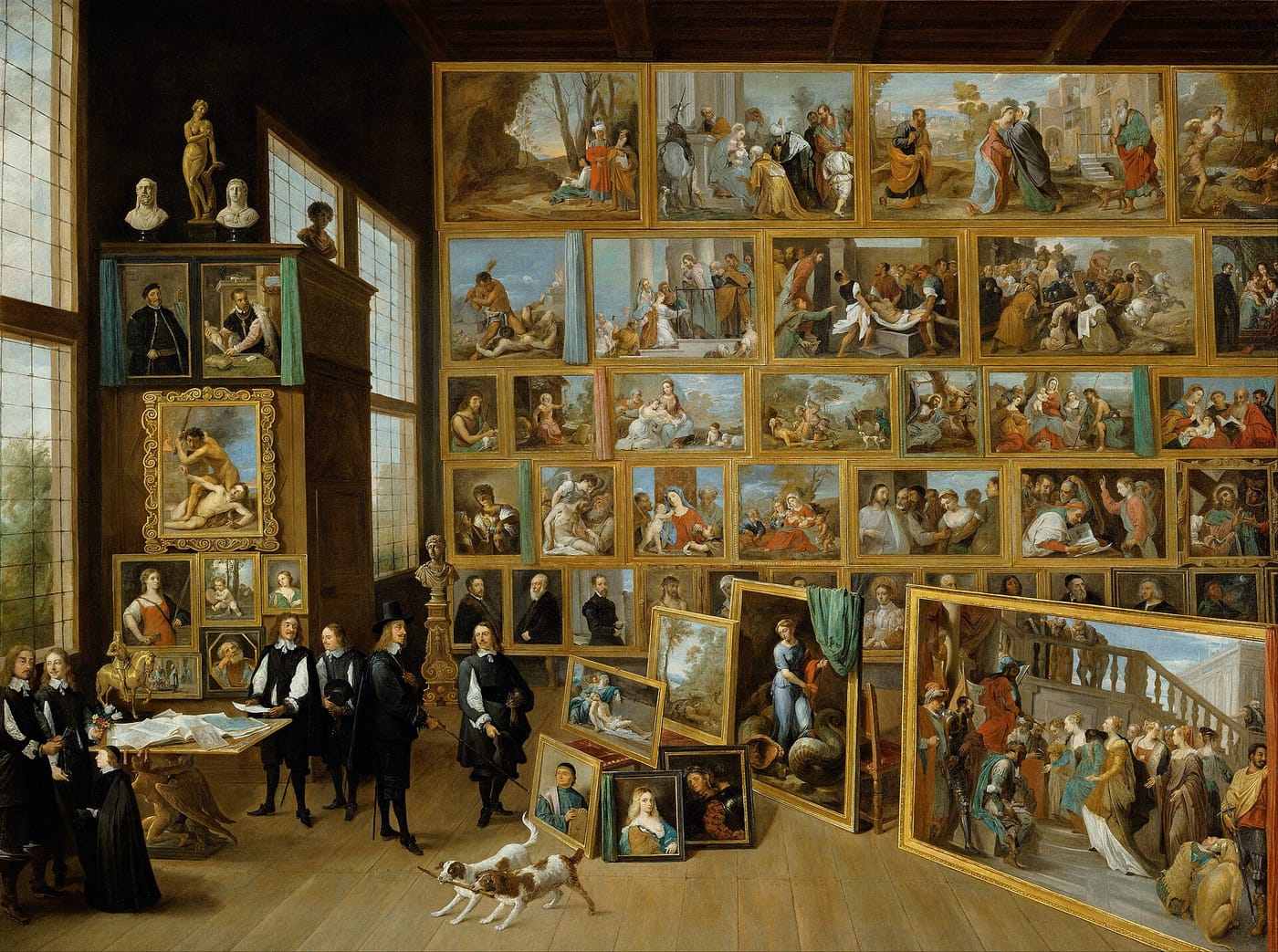 An ornate picture gallery hung with old-master paintings in Vienna